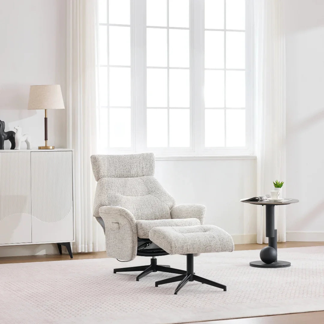 Beige swivel chair with footstool on black base in bright modern living room