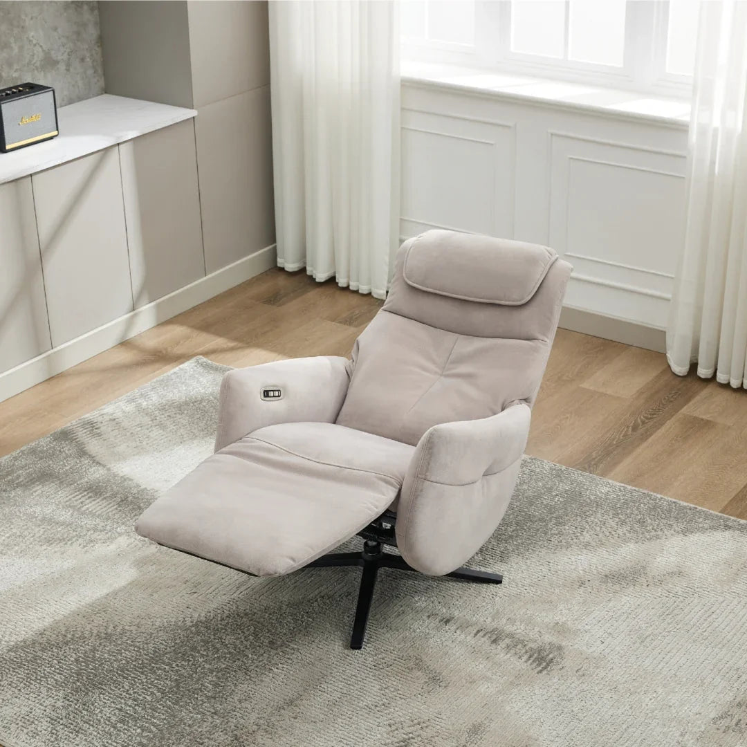 Oyster fabric swivel chair recliner with footrest on a modern rug by window
