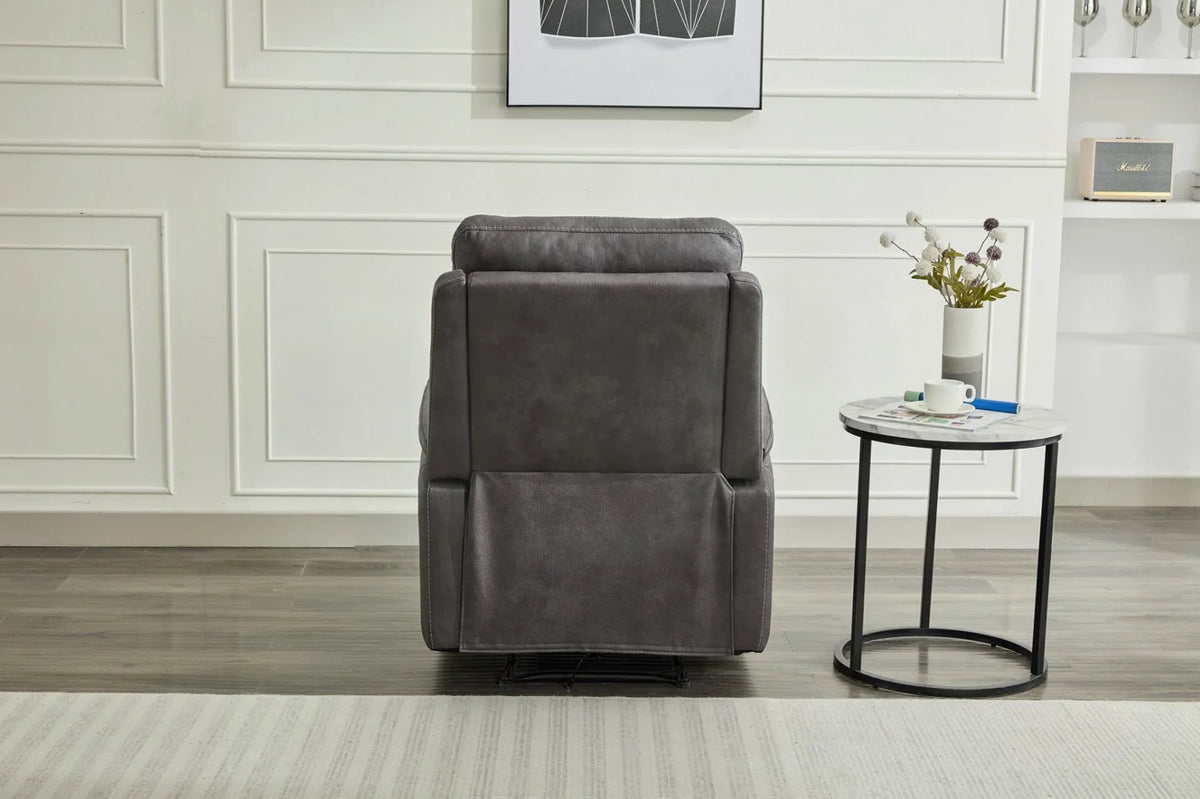 Grey recliner armchair rear view beside round marble side table in modern living room