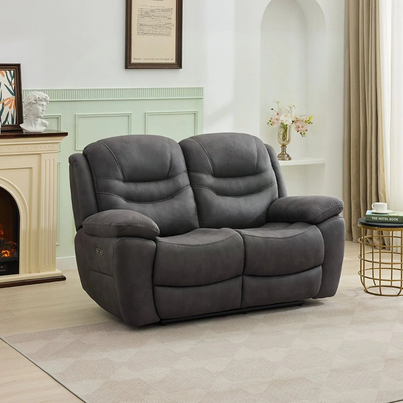 Gunmetal two-seater loveseat sofa with plush cushions in a contemporary living room setting
