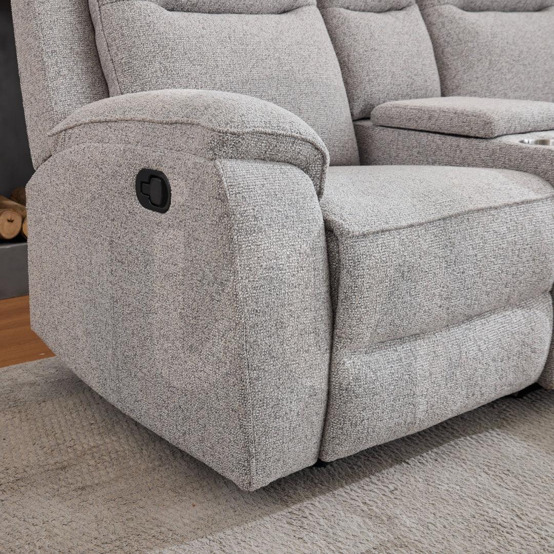Light grey manual recliner sofa arm and seat with fabric upholstery and cup holder console