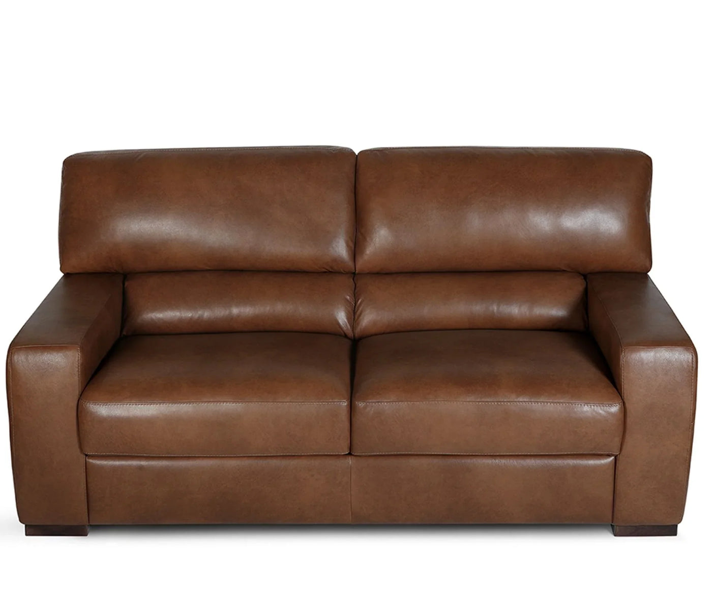 Tan Italian leather sofa with wide armrests and deep seat cushions, front view