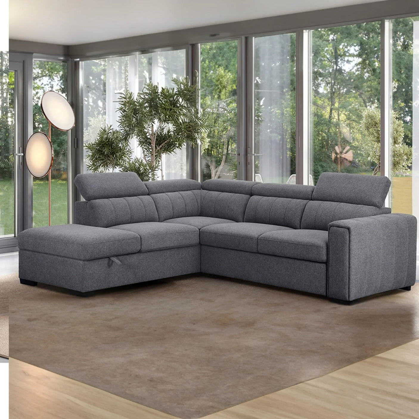 Anthracite grey sectional sofa bed with left hand chaise in modern living room