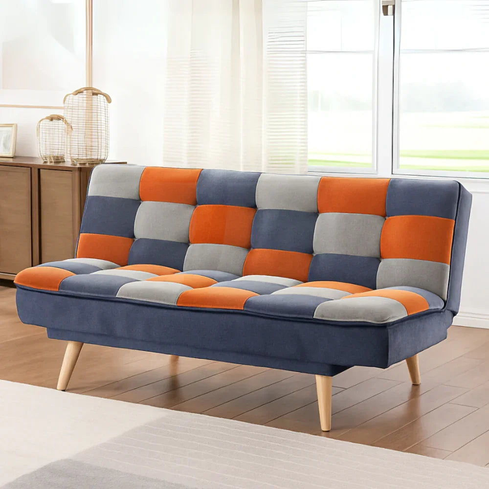 Millstone sofa bed with orange, grey and dark blue patchwork upholstery, wooden legs