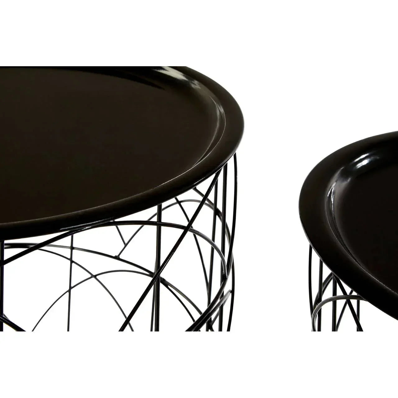 Black metal side tables with round tray tops and wire geometric bases, close-up view