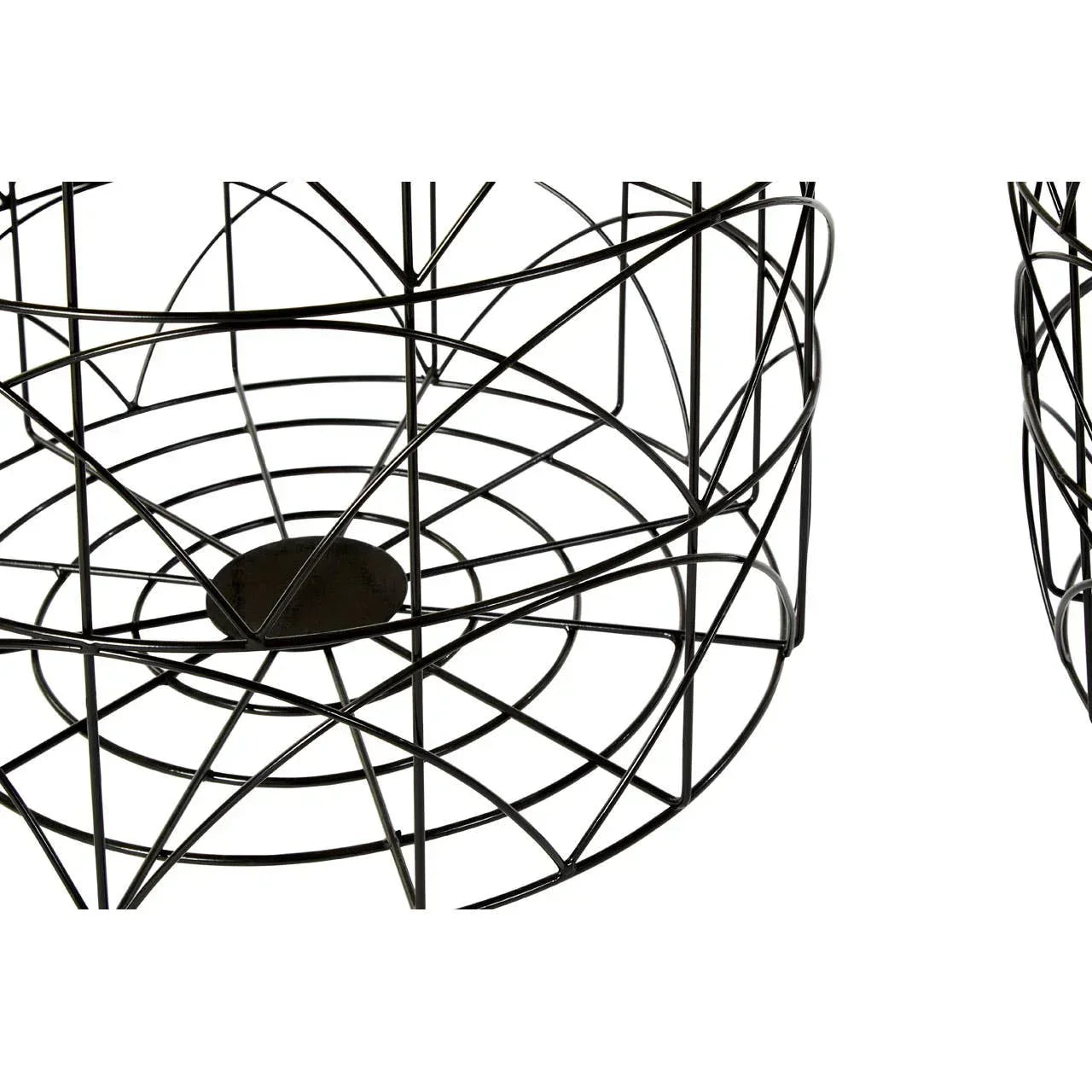Black metal side table base with geometric wire design, close up view