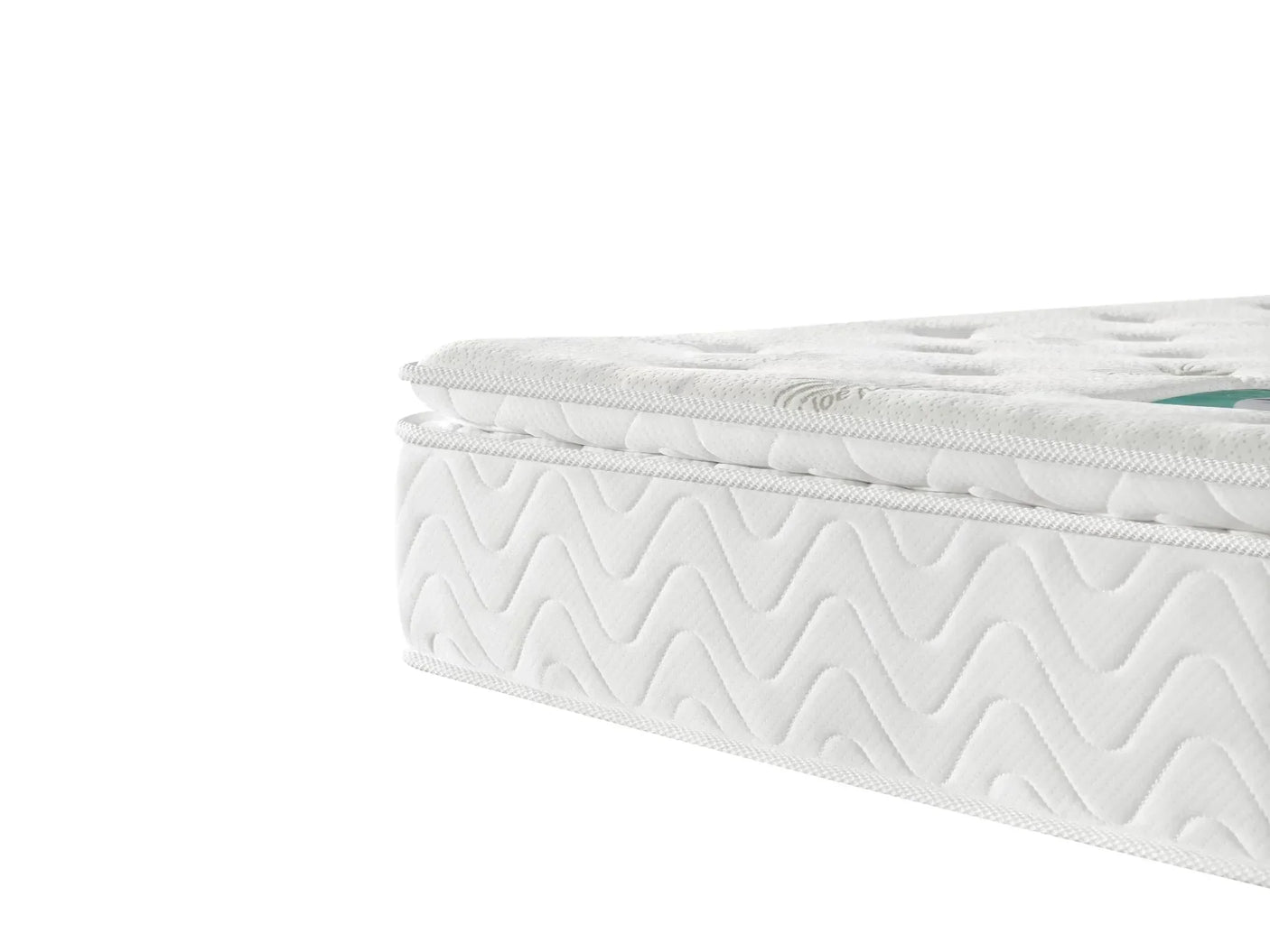 Close-up of white pocket sprung mattress with quilted top and textured side panel