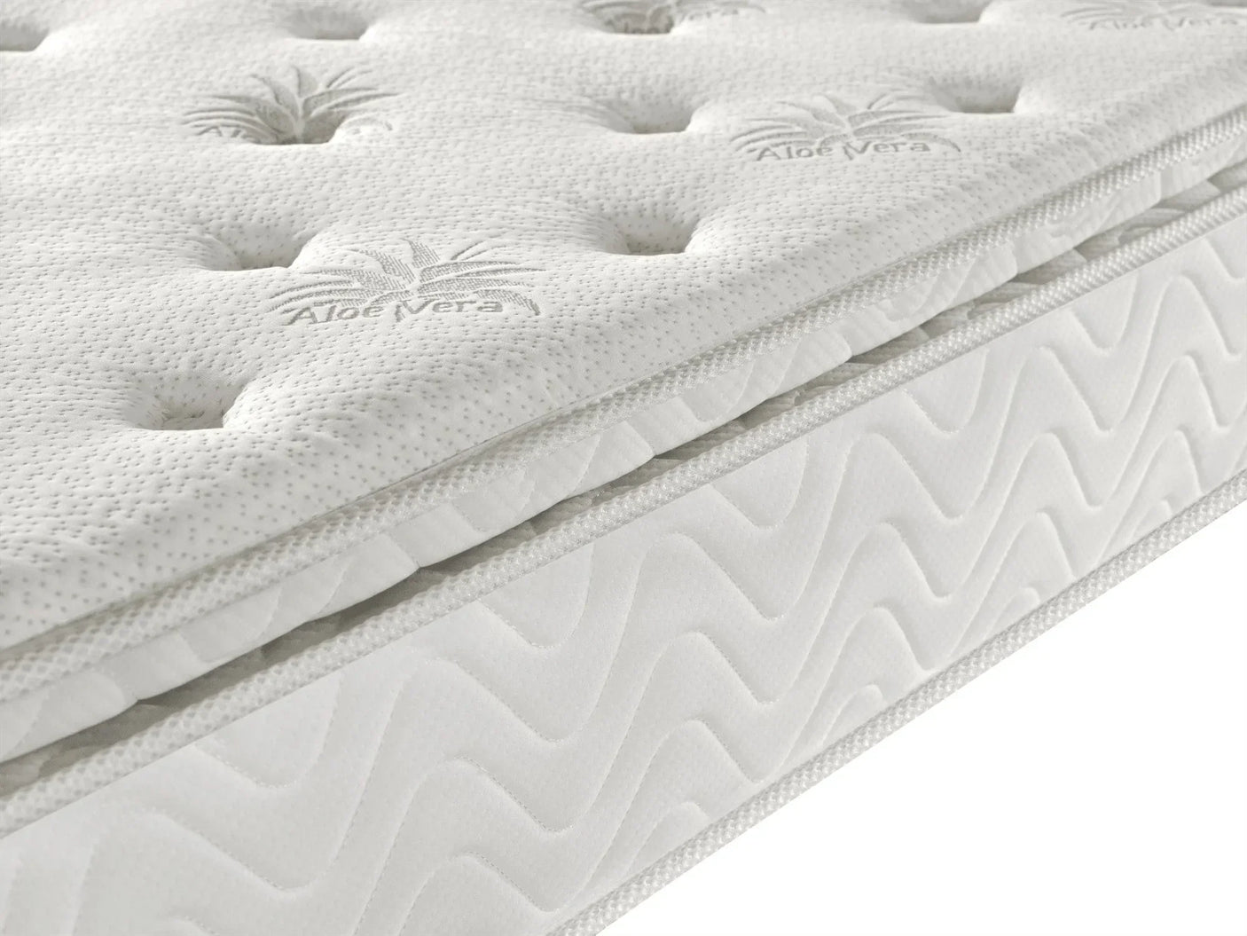 Aloe Vera mattress close-up showing quilted fabric and soft top layer detail