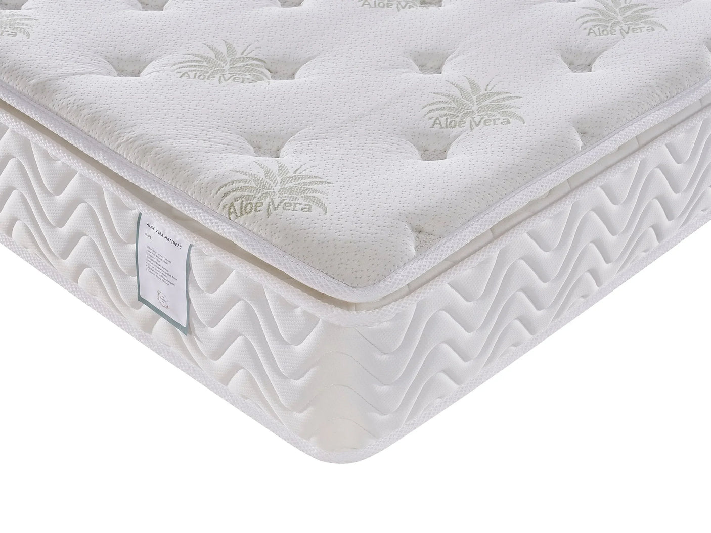 Aloe vera mattress corner with quilted top and white textured fabric