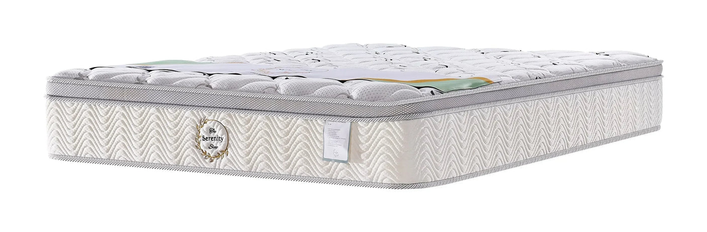 Serenity Sleep mattress with quilted top and wave patterned sides, angled front view
