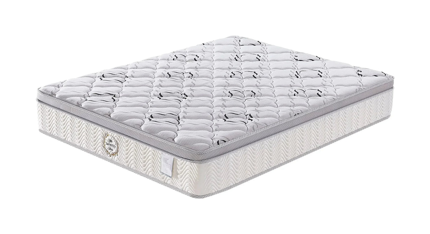 Double mattress with quilted top and white patterned sides, angled on plain background