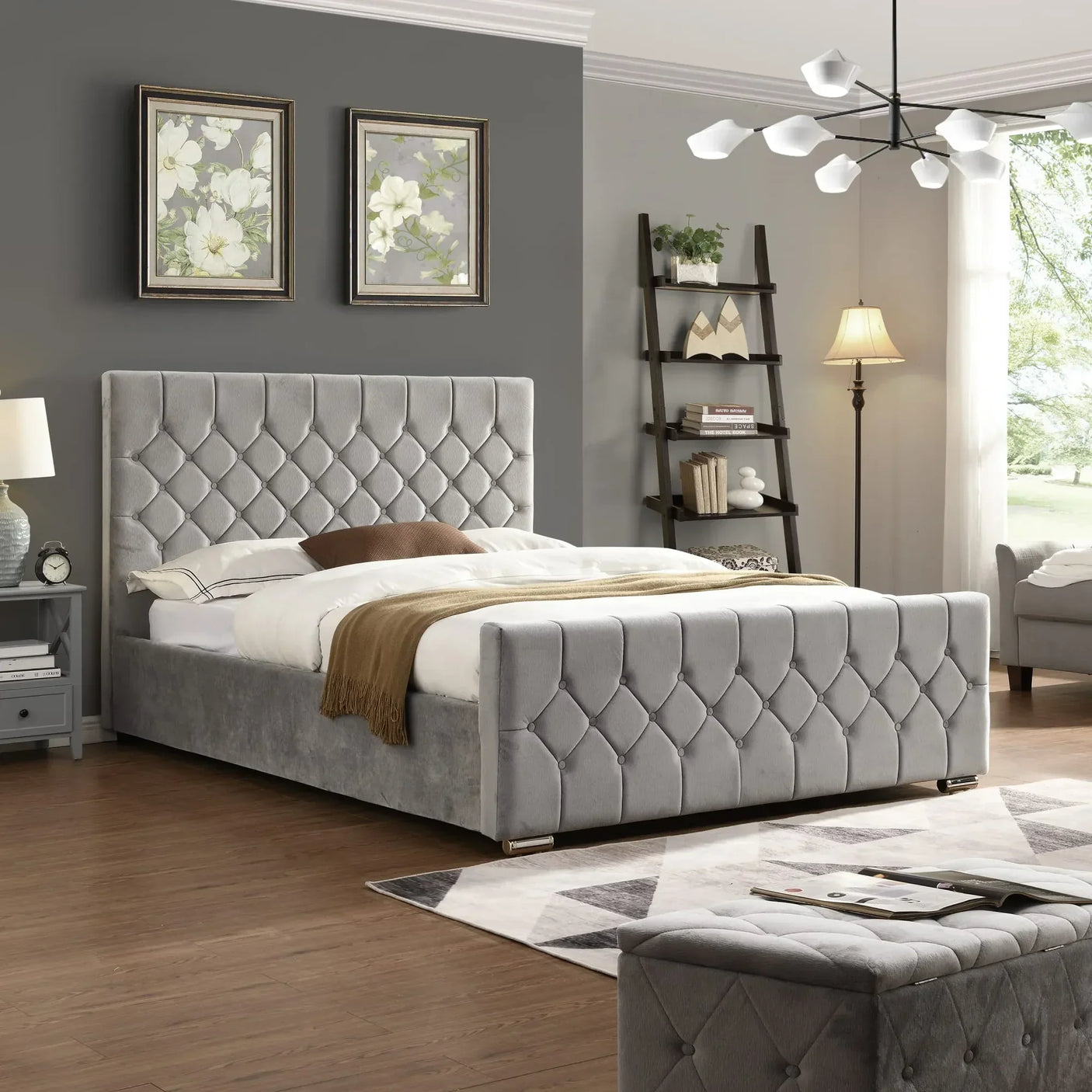 Grey velvet upholstered bed frame with button-tufted headboard and footboard in modern bedroom