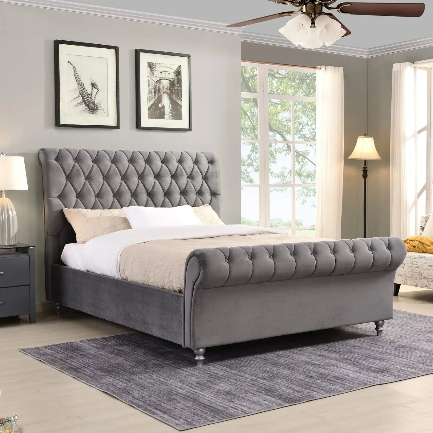 Grey velvet bed frame with button-tufted headboard in modern bedroom setting