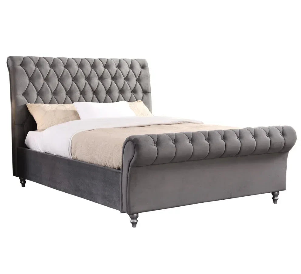Grey velvet upholstered bed frame with button tufted headboard and footboard