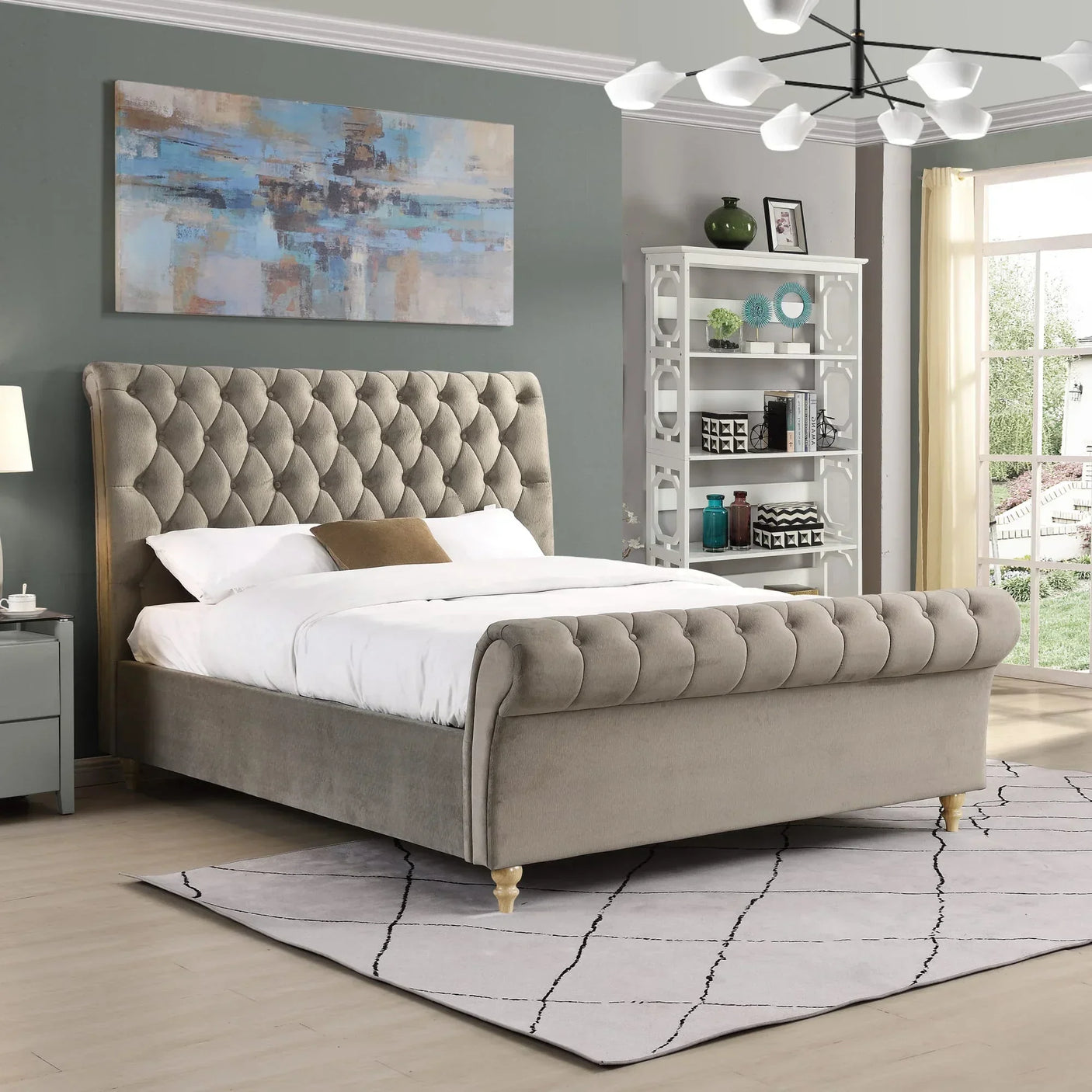 Grey upholstered bed with tufted headboard and footboard in modern bedroom setting