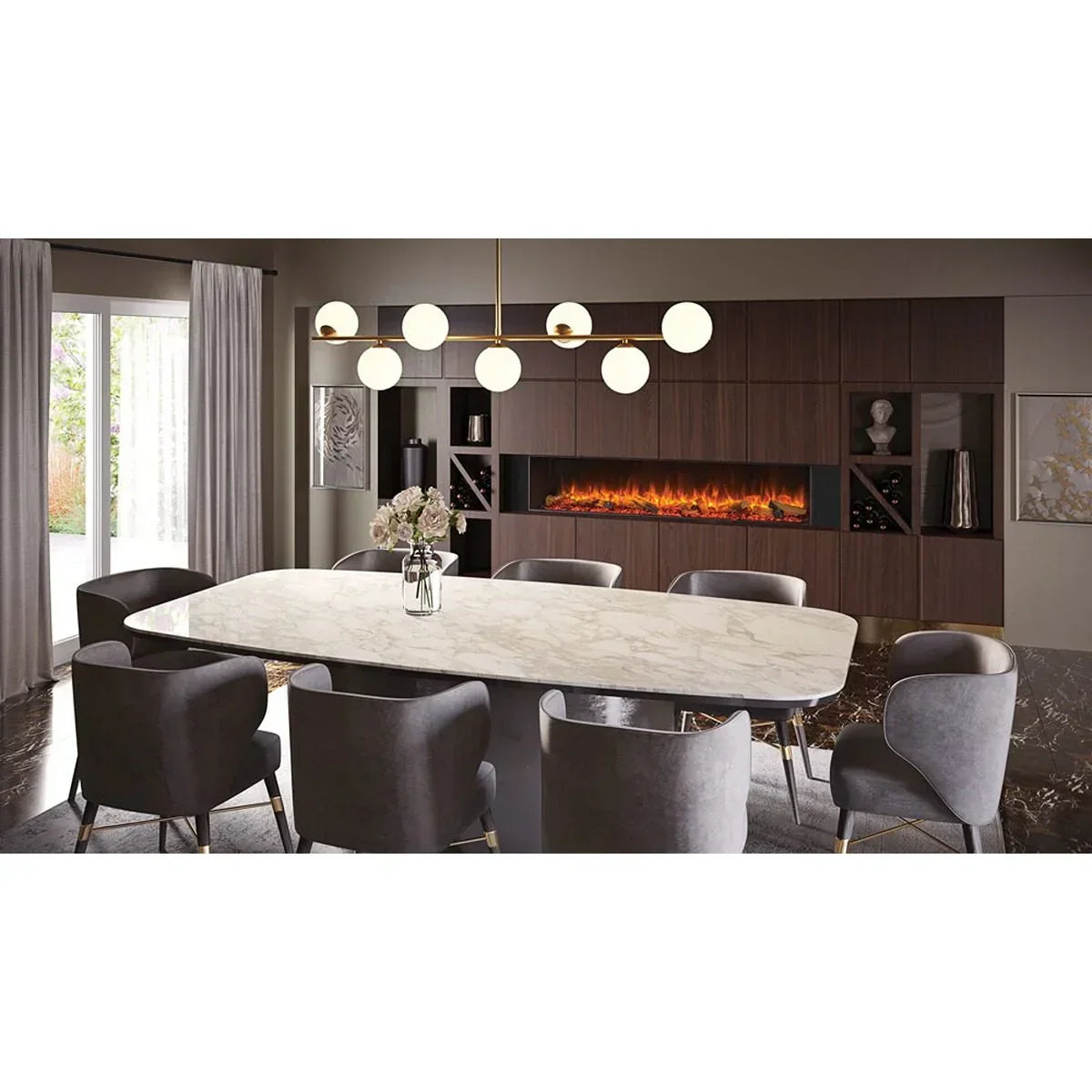 Marble dining table with eight grey chairs, modern chandelier, and wall-mounted fireplace