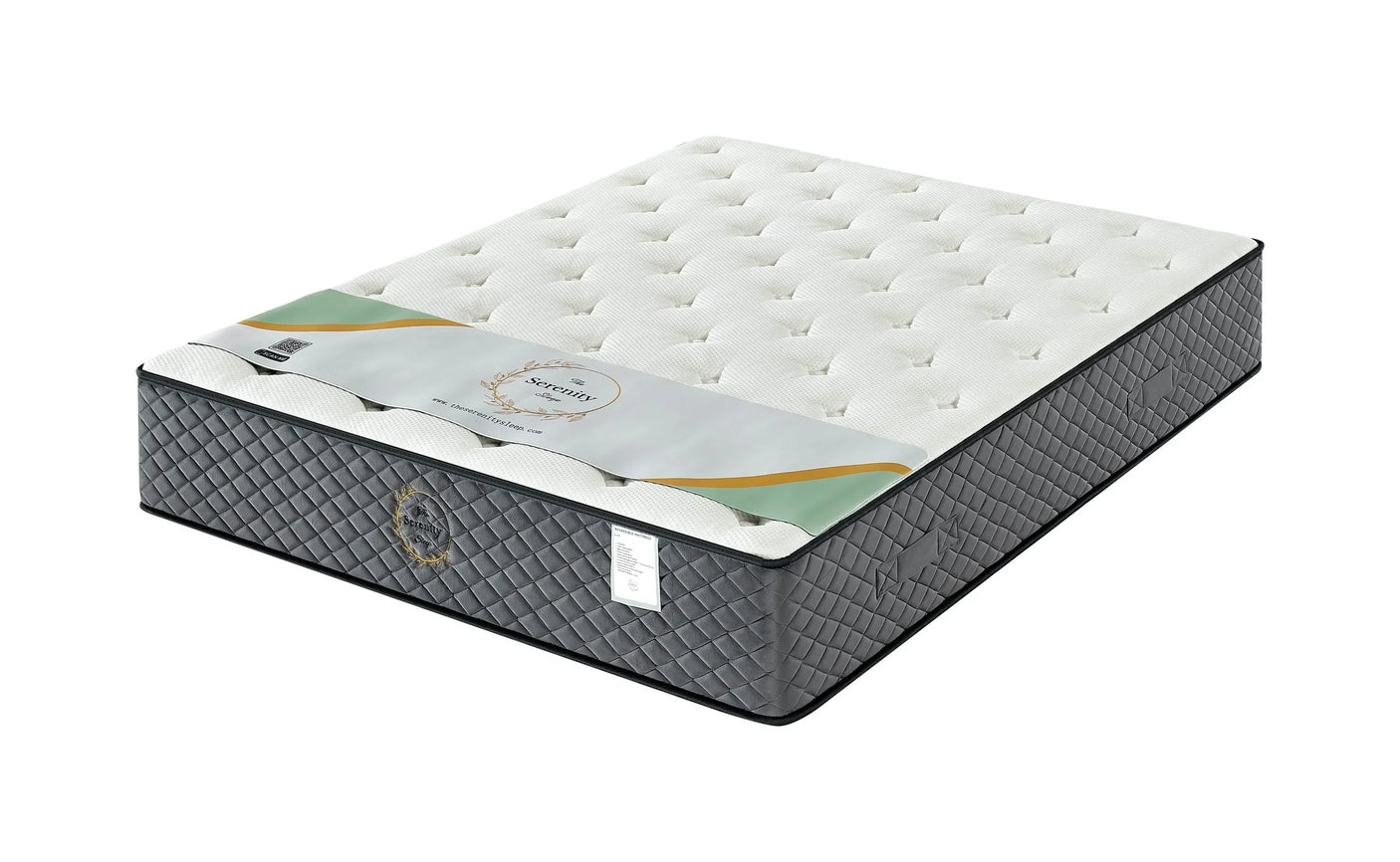 Double mattress with quilted grey sides and white tufted top, corner angle view
