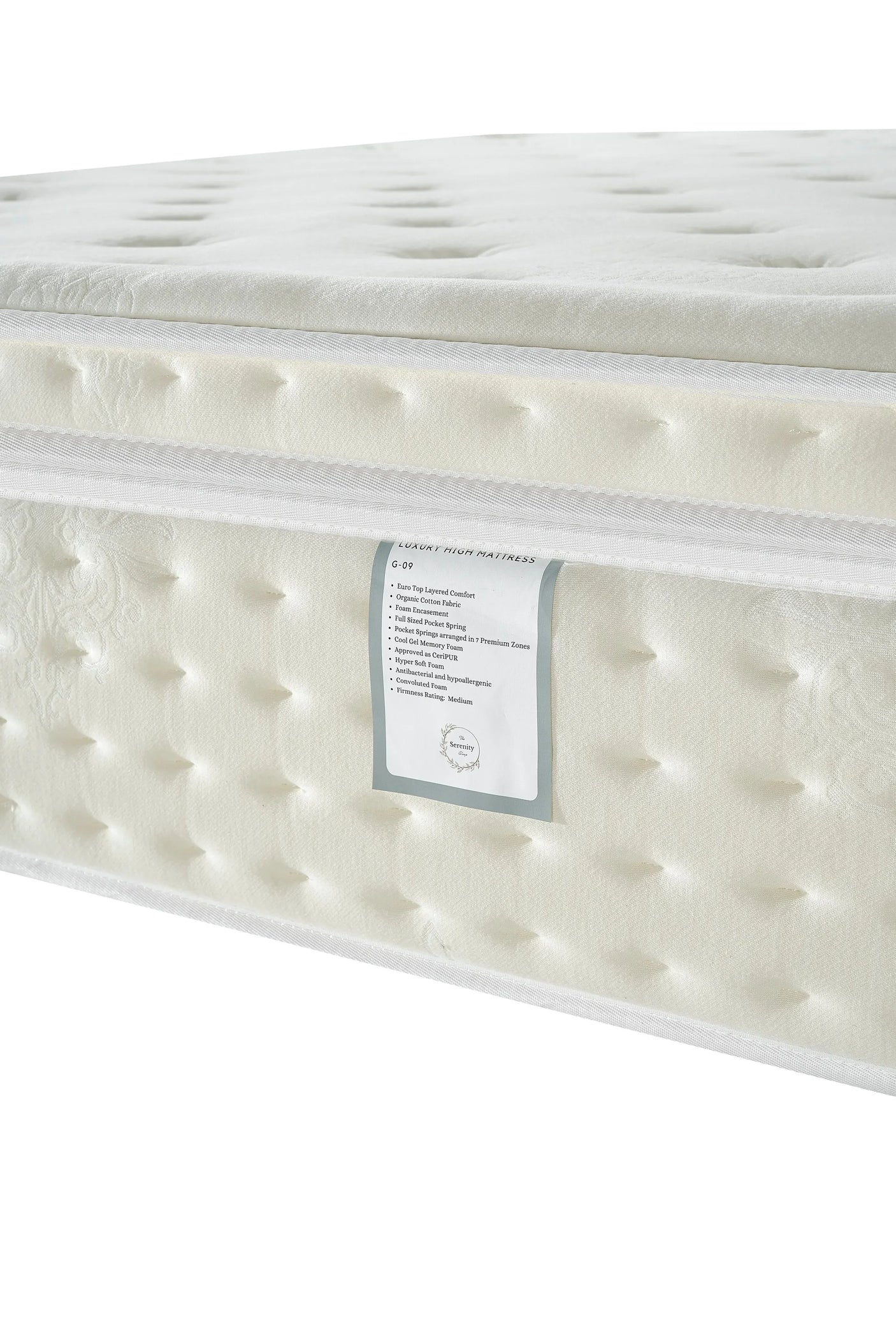 Close-up of luxury white mattress with pillow top and tufted detailing