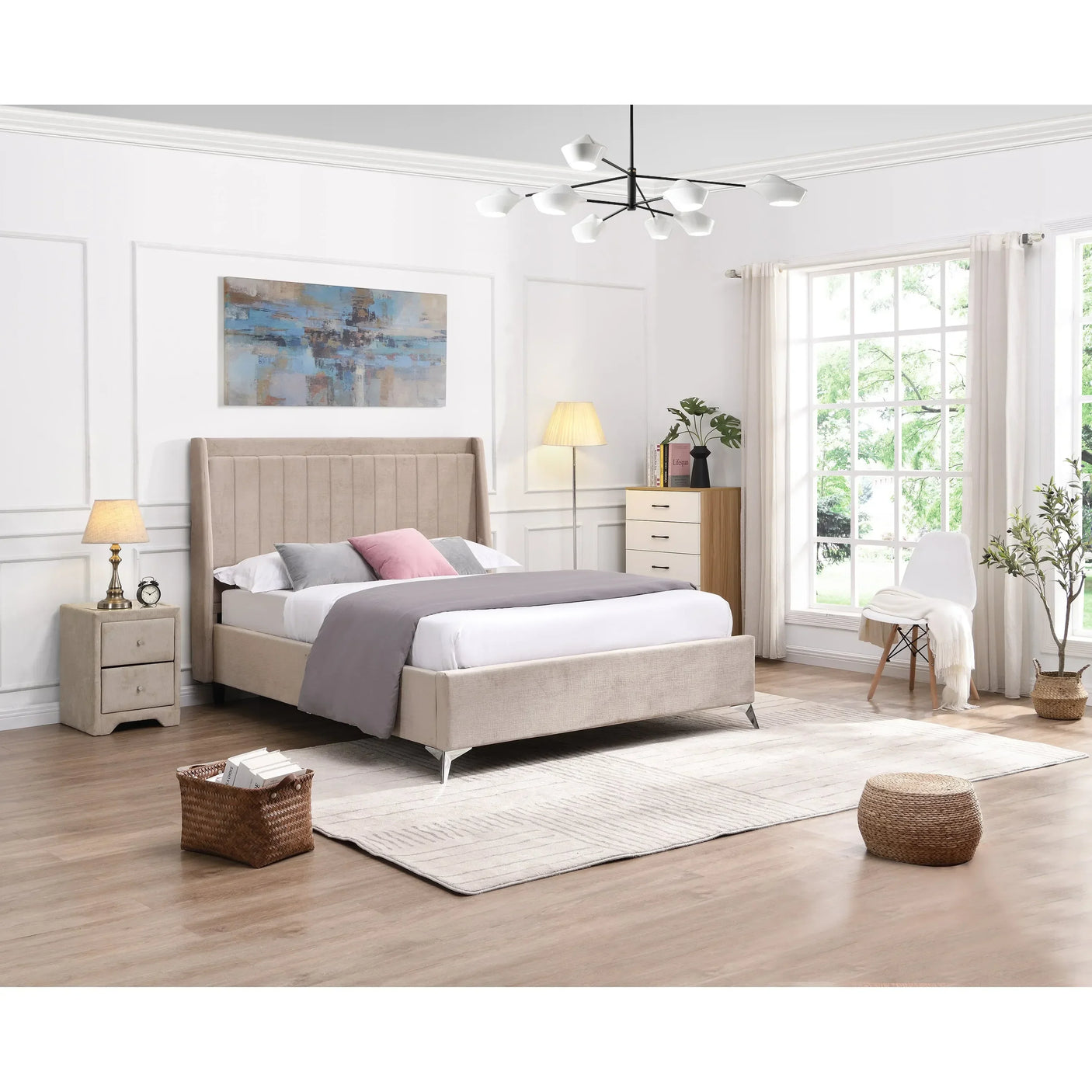 Beige upholstered bed with padded headboard in modern bedroom, wooden floor and large window