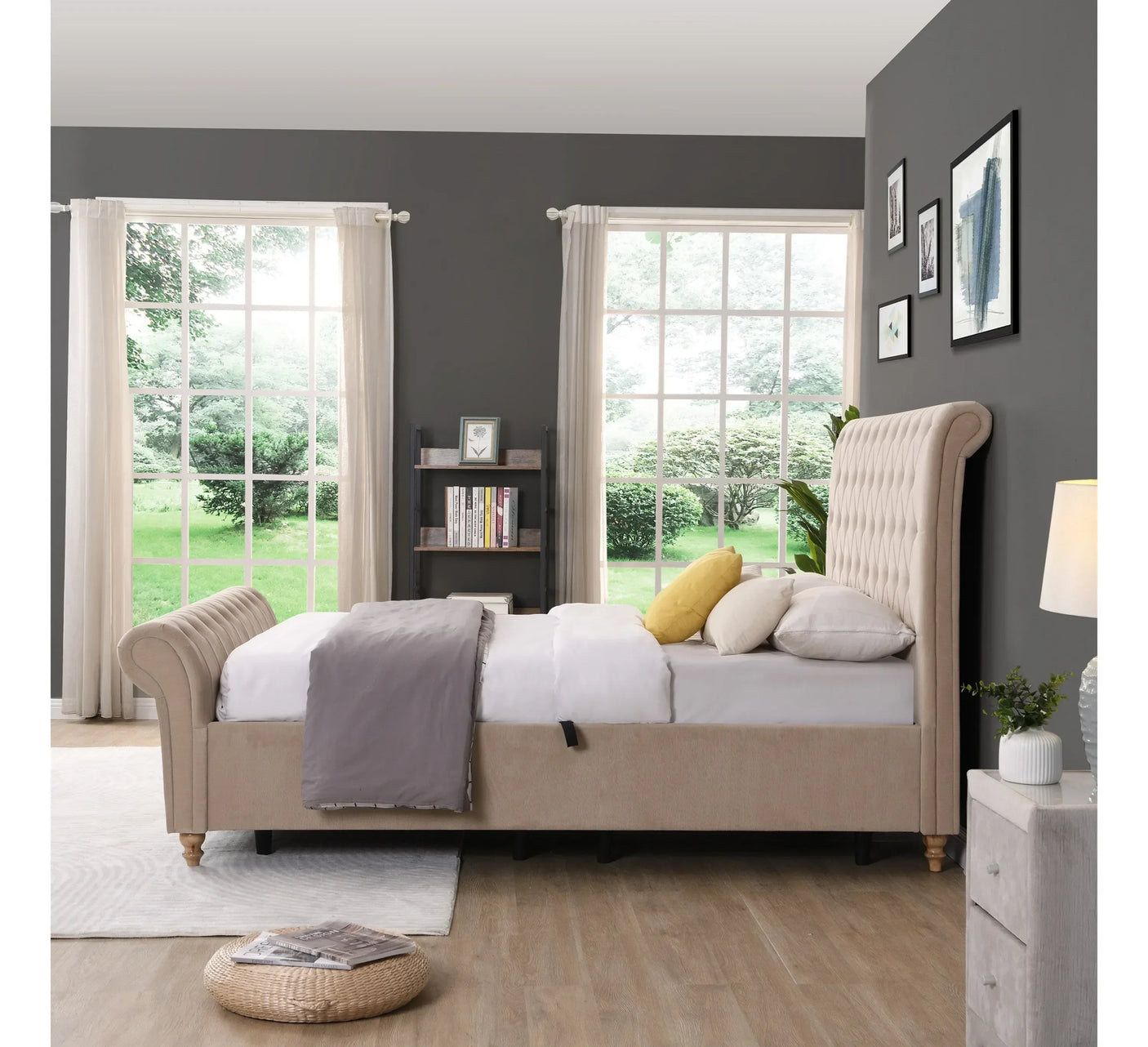 Beige upholstered bed with buttoned headboard in modern bedroom with grey walls