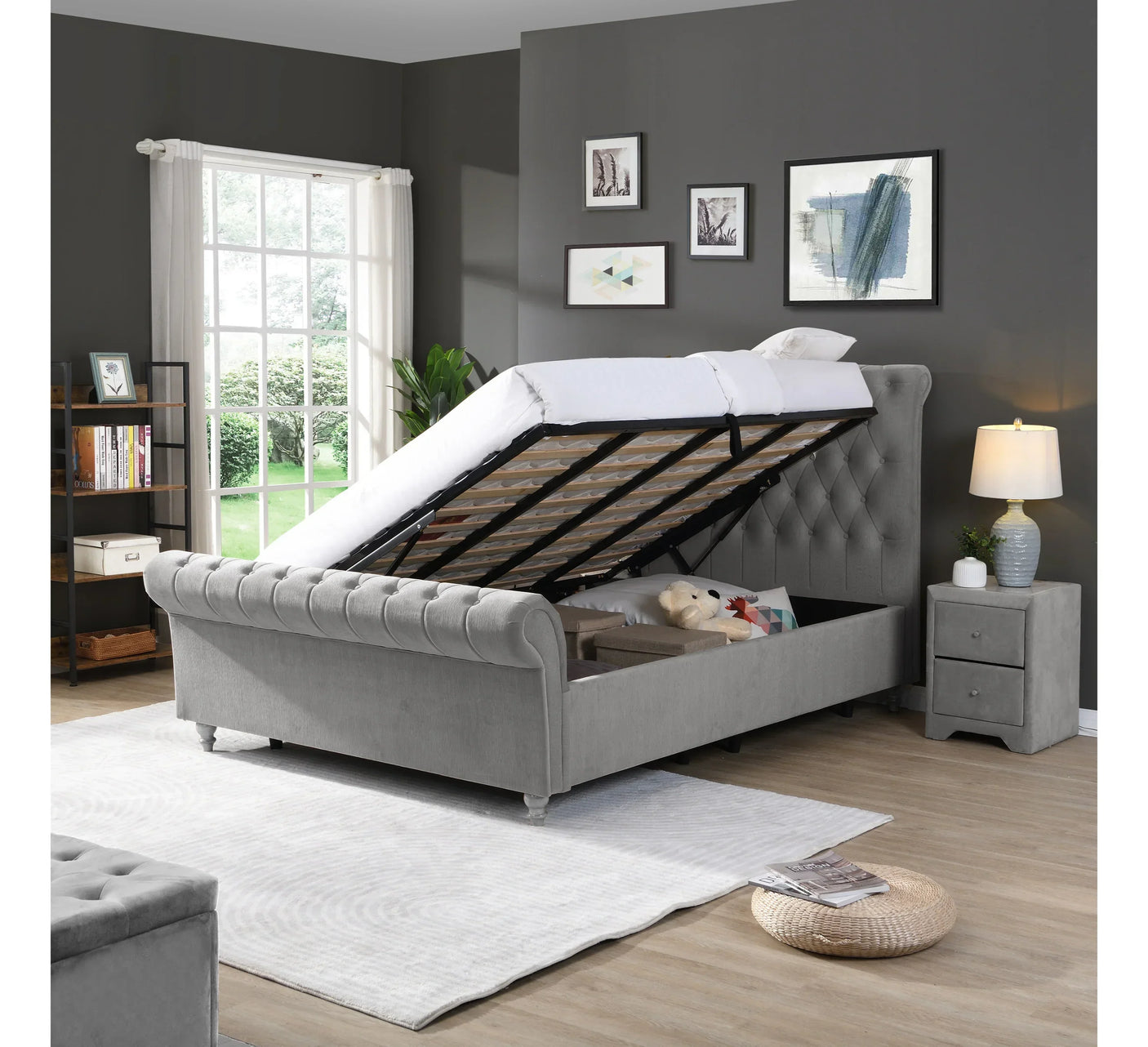 Grey upholstered ottoman storage bed frame with lifted mattress in modern bedroom