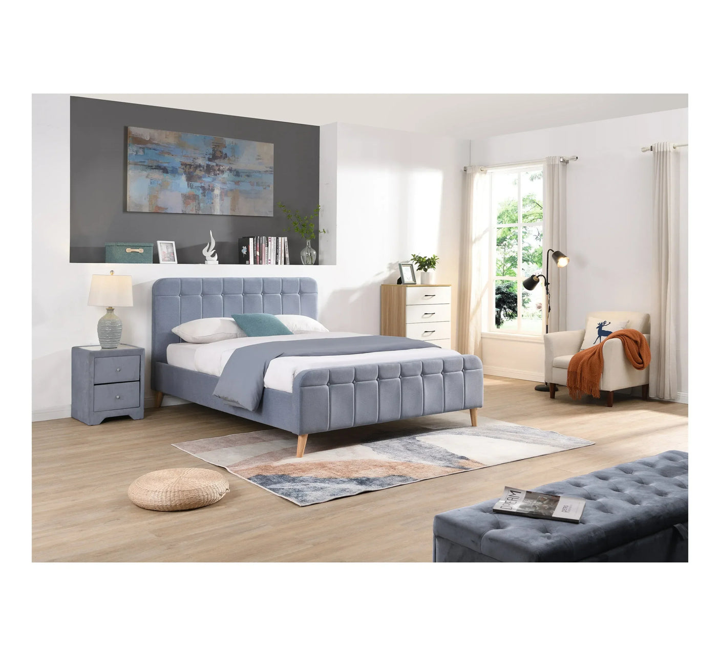 Grey upholstered bed frame with matching bedside table in a modern bedroom setting