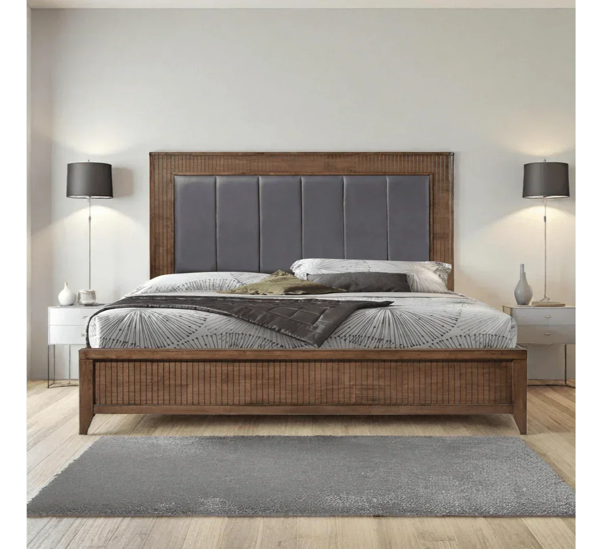 Wooden bed frame with upholstered headboard, grey bedding, and modern bedside tables