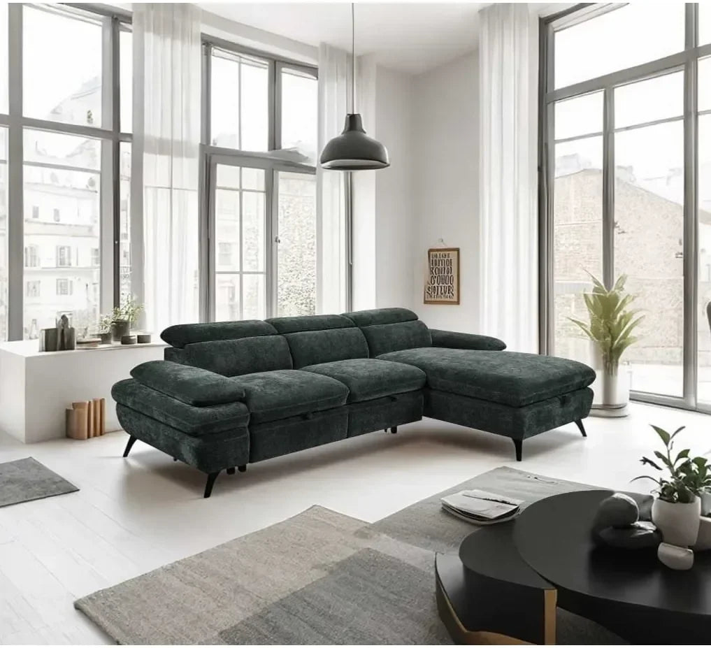 Dark grey corner sofa with chaise in modern living room with large windows and black coffee table