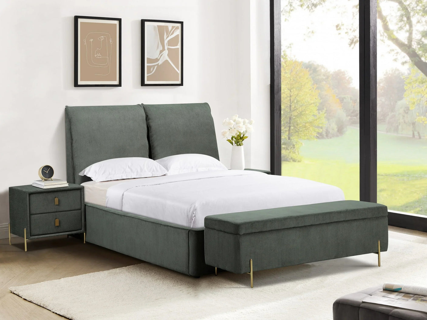 Green upholstered bed with white bedding, matching bench and bedside table in modern bedroom