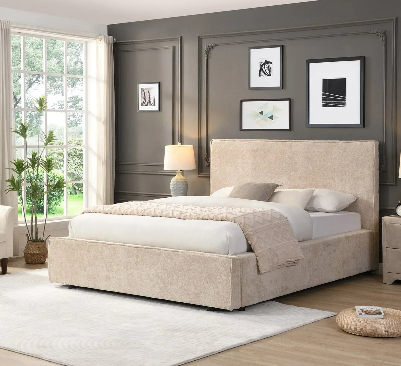 Beige upholstered bed frame with headboard in bright modern bedroom setting