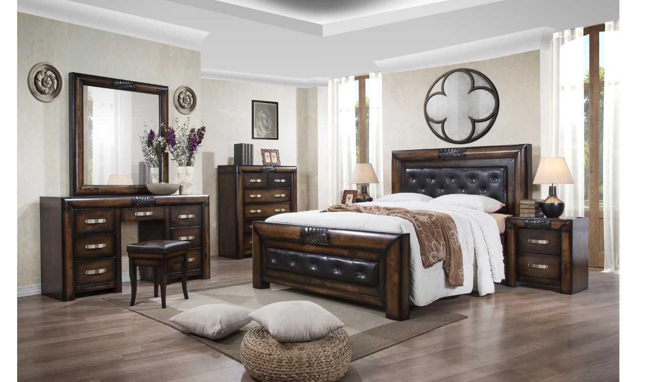 Dark wood bedroom furniture set with upholstered bed, dresser, chest, and bedside tables