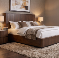 Elegant Cleo Bed with a wooden headboard, soft bedding, and stylish nightstands in a cozy setting