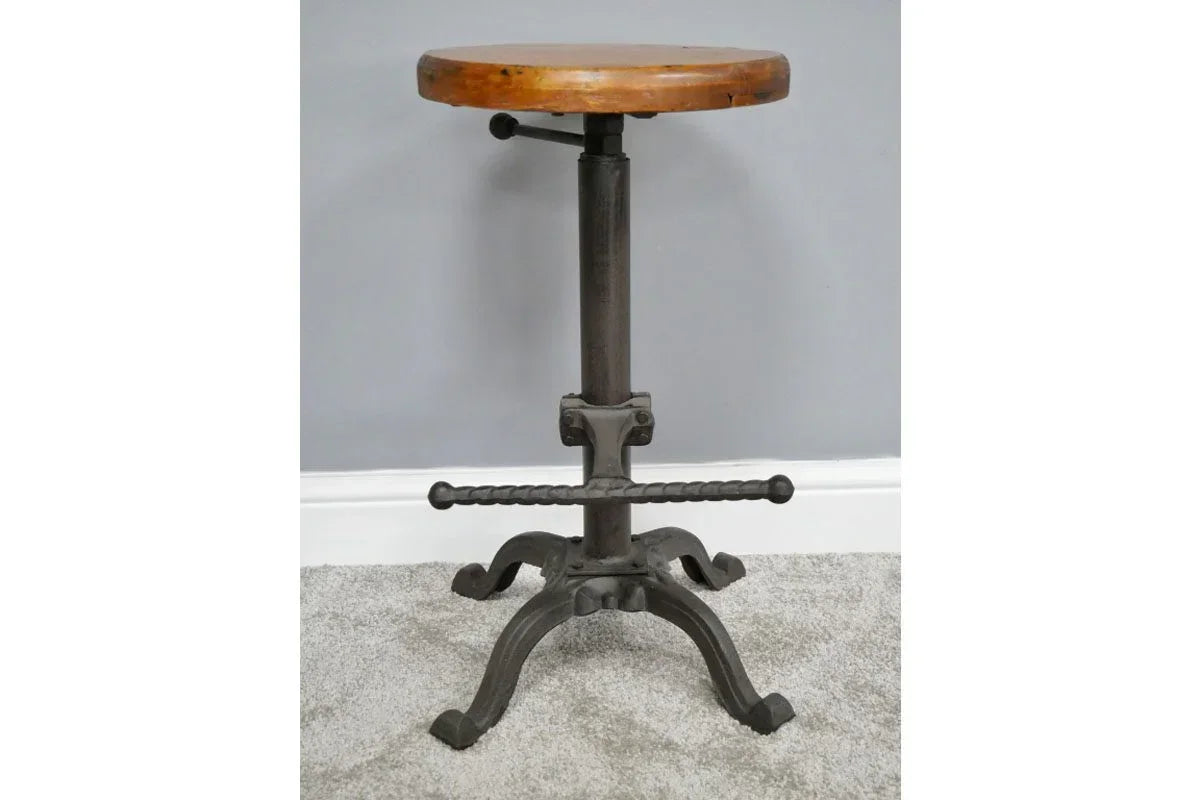 Industrial bar stool with round wooden seat and black metal adjustable base
