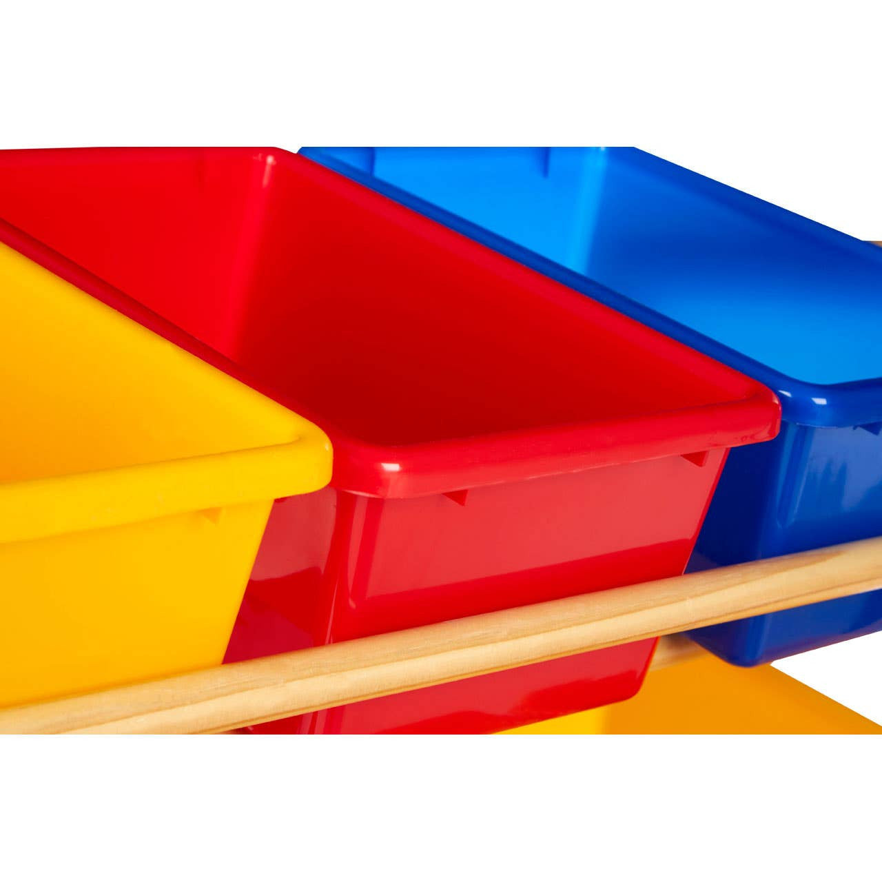 Three colorful storage bins in red, yellow, and blue are arranged in a tiered configuration, with a light wooden frame supporting them. The bins are designed for easy access and organization, showcasing a playful and functional design suitable for children's rooms