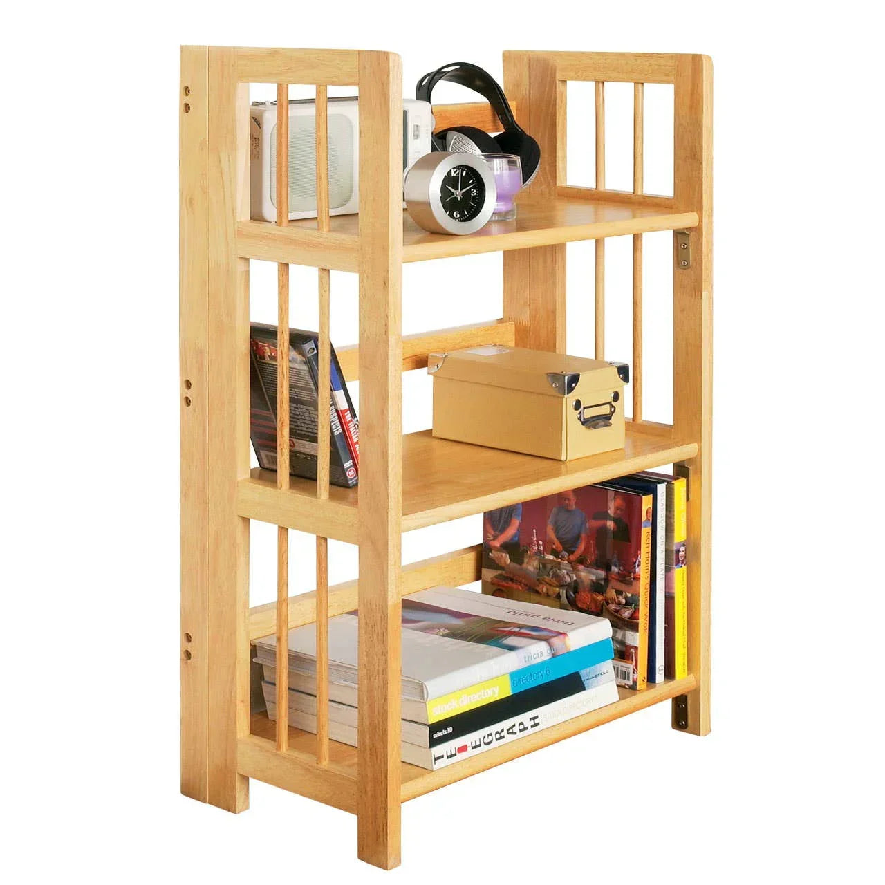 Light wood bookcase with open sides, three shelves, books and decor items displayed