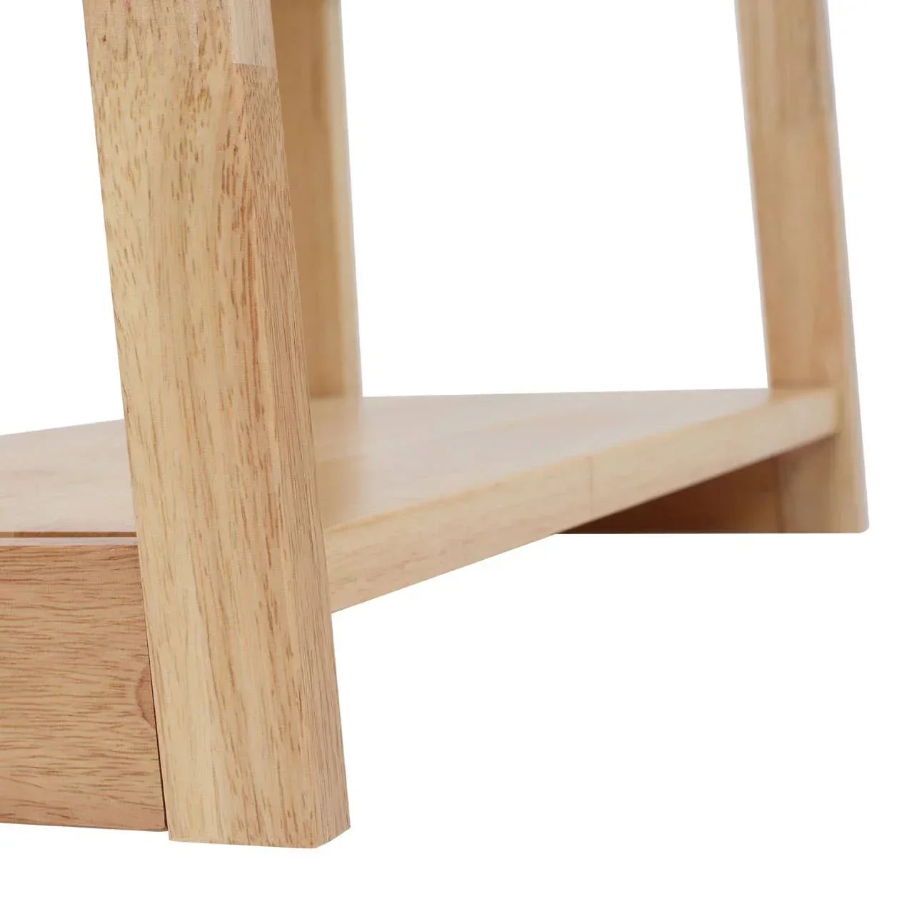 Close-up of light wood table leg and shelf, smooth finish, modern furniture detail