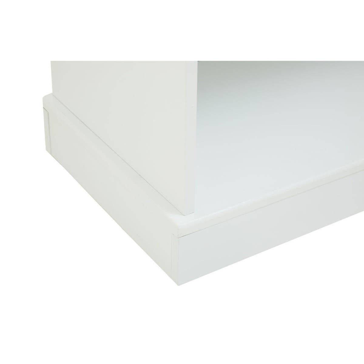 Close-up view of the corner of a white Portland Storage Unit, showcasing its smooth edges and clean lines, with a visible shelf and a sturdy base