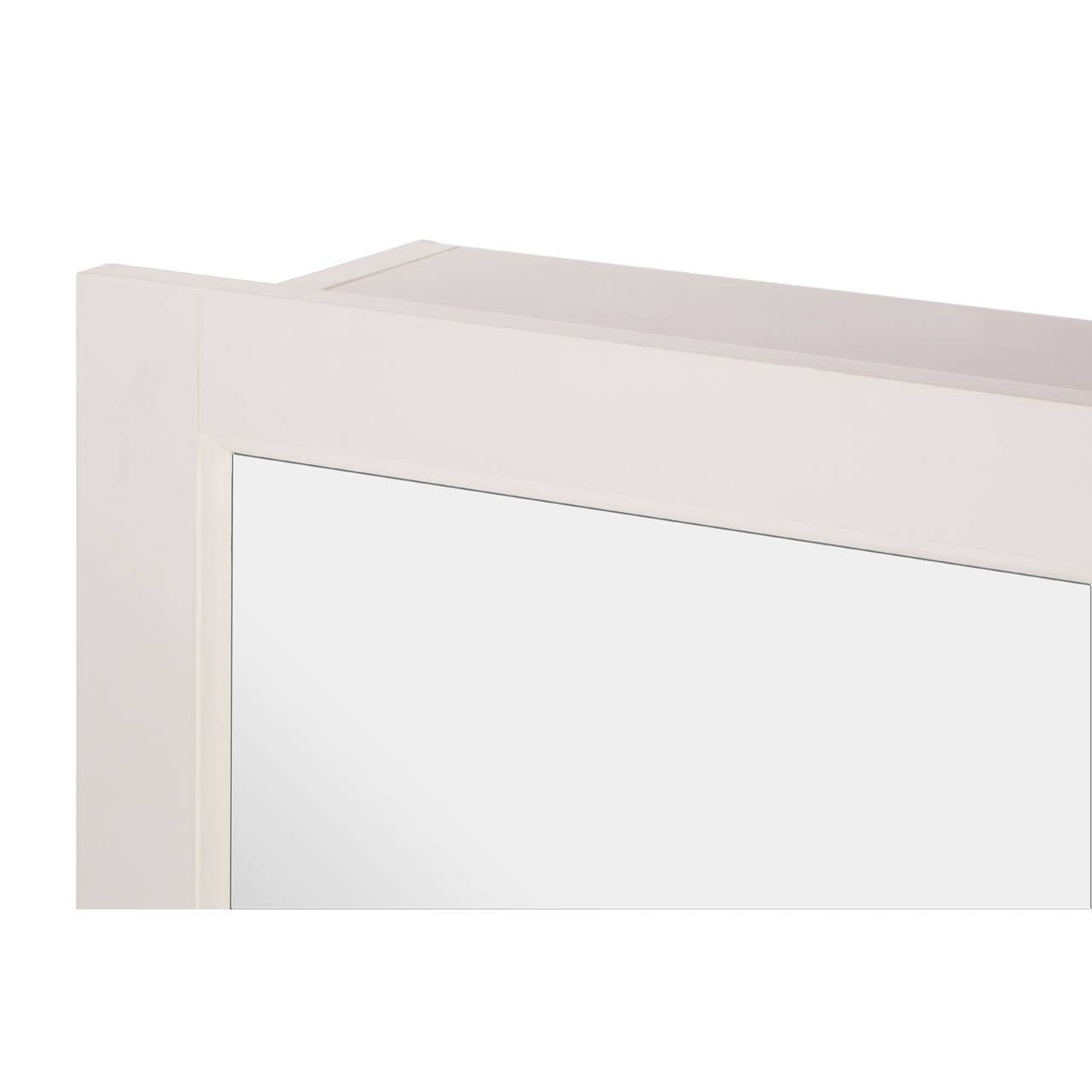 A close-up view of the Port Mirrored Wall Cabinet featuring a sleek, modern design with a smooth, reflective surface and a soft-colored frame. The cabinet has a rectangular shape with two inner shelves visible through the mirror, providing functional storage space