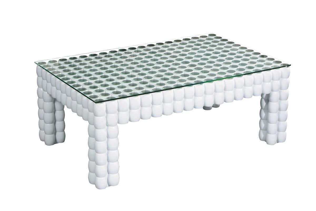 modern coffee table with glass top and white rounded leg design