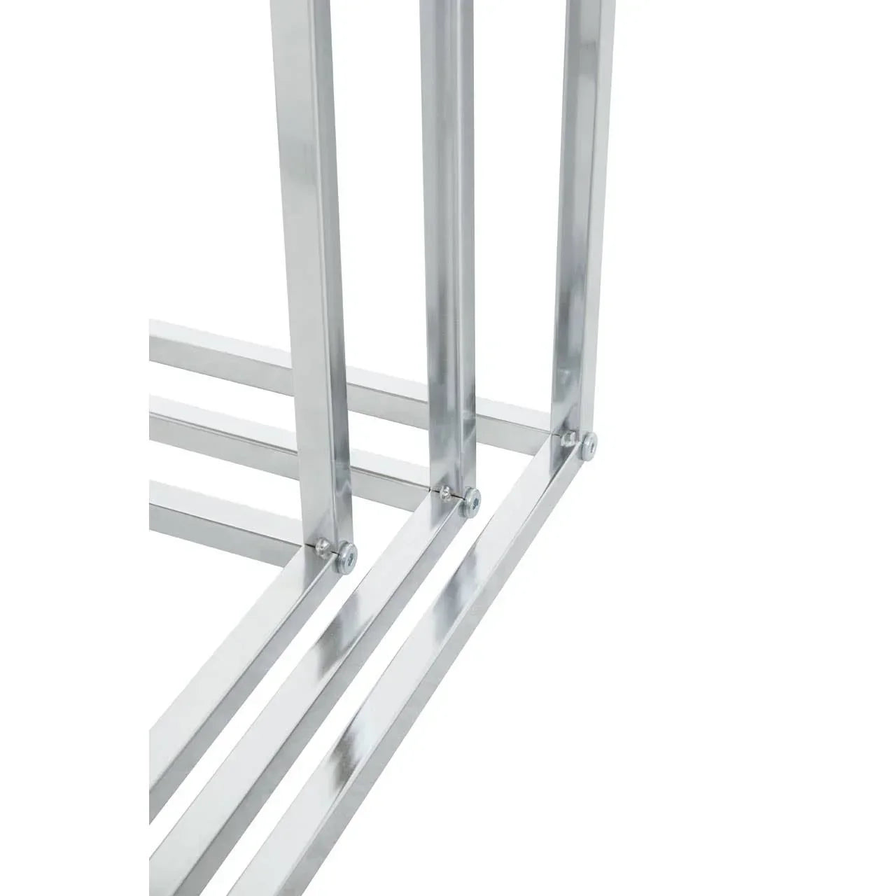 Close up of chrome metal table legs and frame with modern angular design