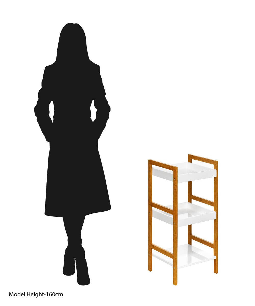 Three-tier small shelf unit with a sleek white high gloss finish, featuring a modern design and wooden accents. The unit is positioned next to a silhouette of a person wearing a coat, providing a sense of scale