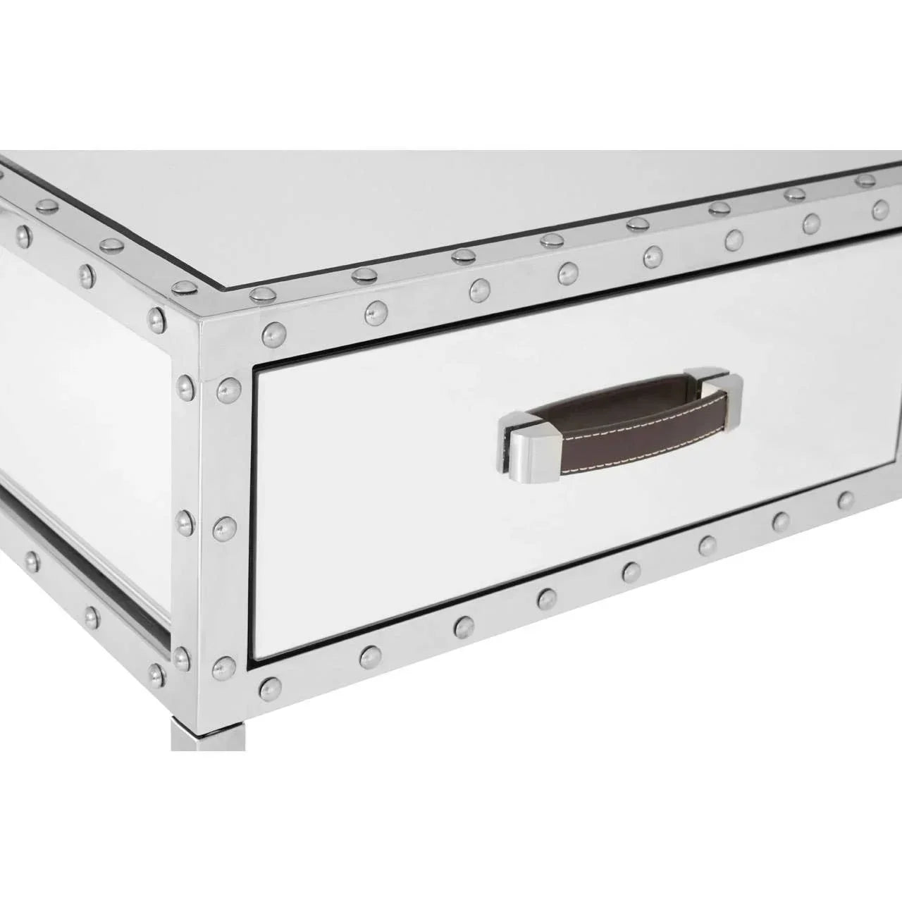 Modern metal side table with rivet detailing and leather handle drawer, close-up view