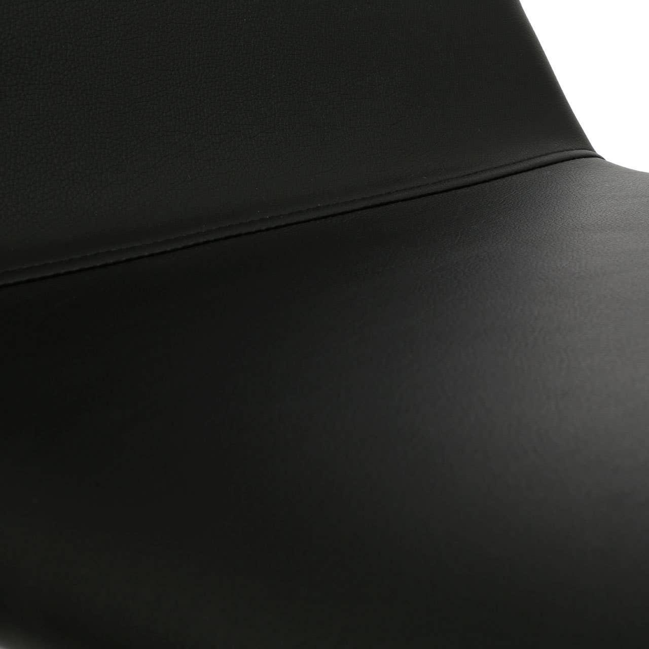 black faux leather dining chair seat close-up showing seam detail