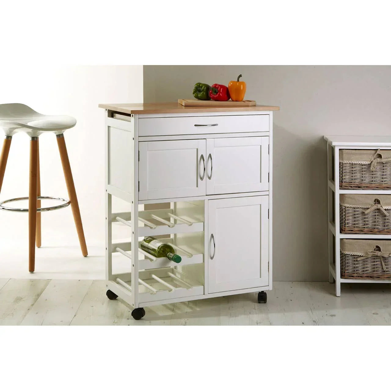 White kitchen storage trolley with wooden top, wine rack and drawers on wheels