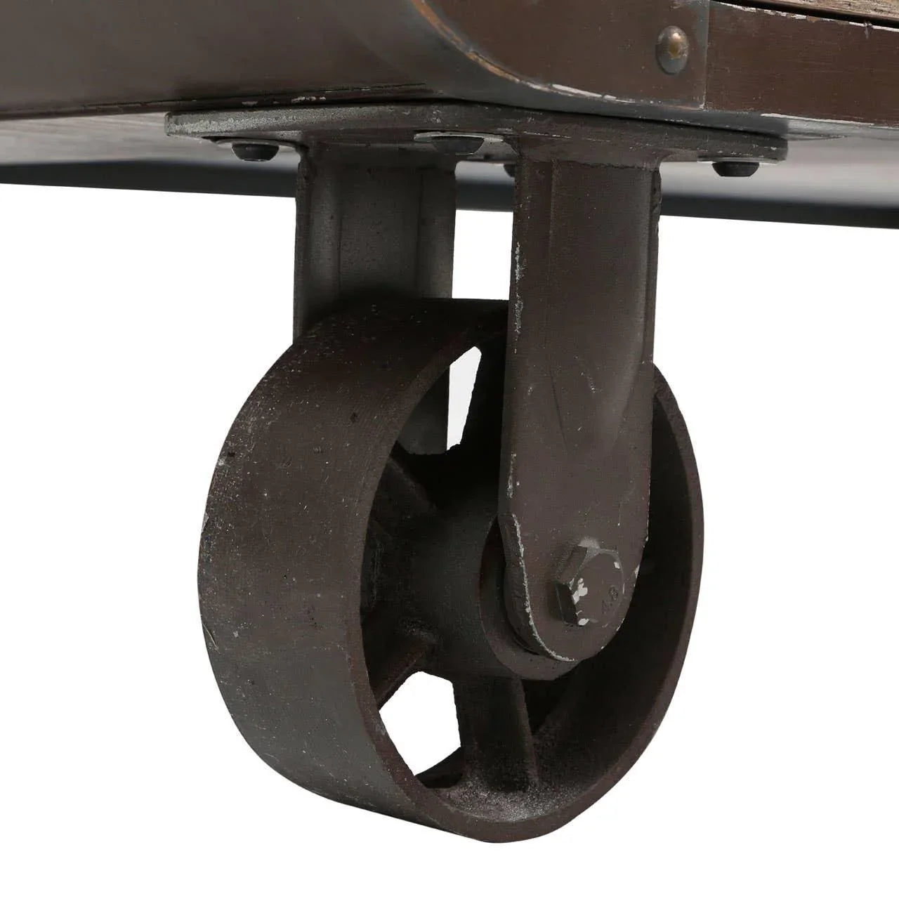Industrial coffee table metal wheel with rustic finish, close-up of cast iron caster