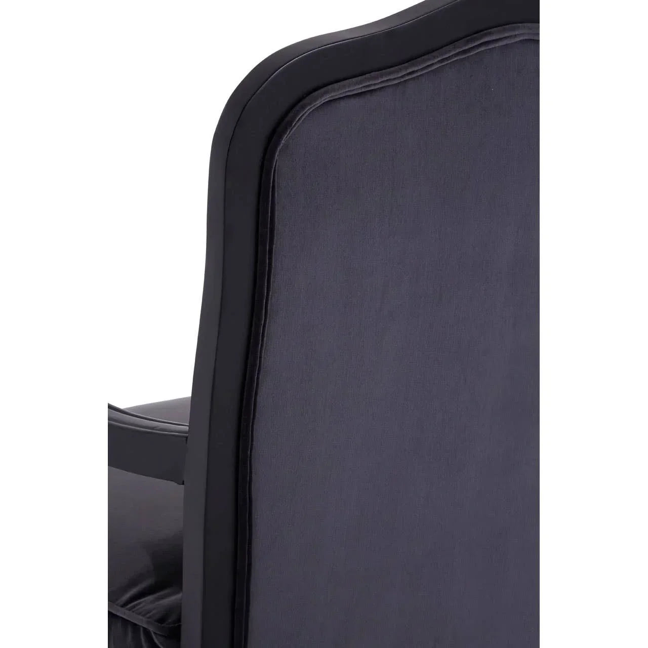 Close-up of dark fabric armchair backrest with black wood frame
