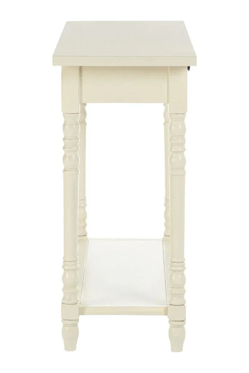 Side view of cream wood console table with turned legs and lower shelf