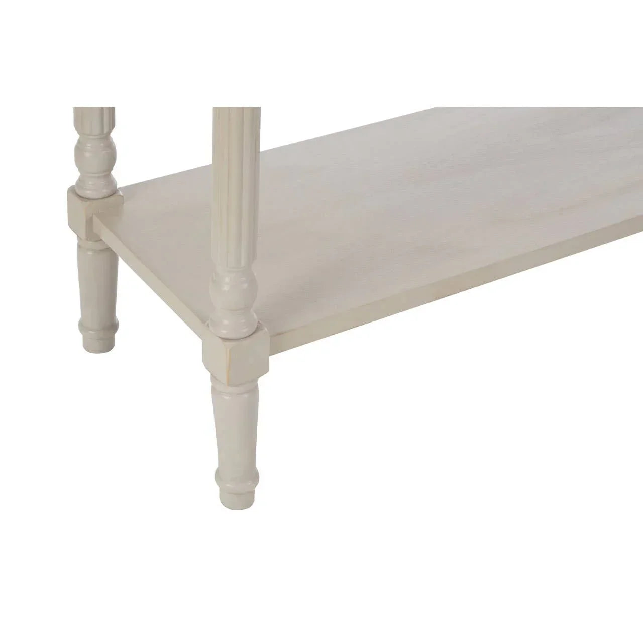Close detail of cream painted wooden table legs and lower shelf