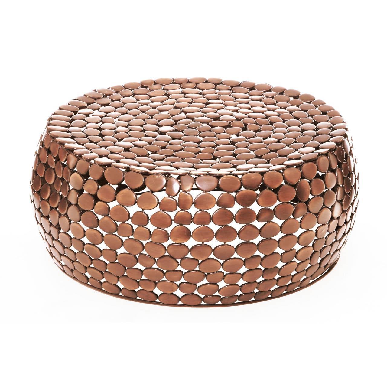 Round copper coffee table with metal pebble design and openwork detail