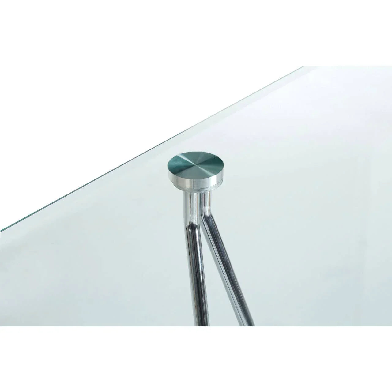 Corner view of glass dining table with chrome metal leg and support detail